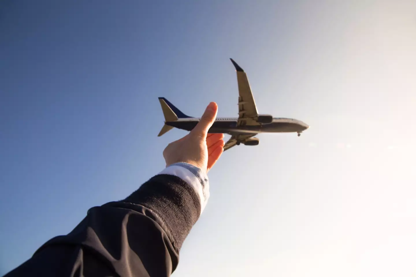 There are many ways to create optical illusions but picking up a plane out the sky is not something that would confuse the internet... unless it actually happened (Getty stock)