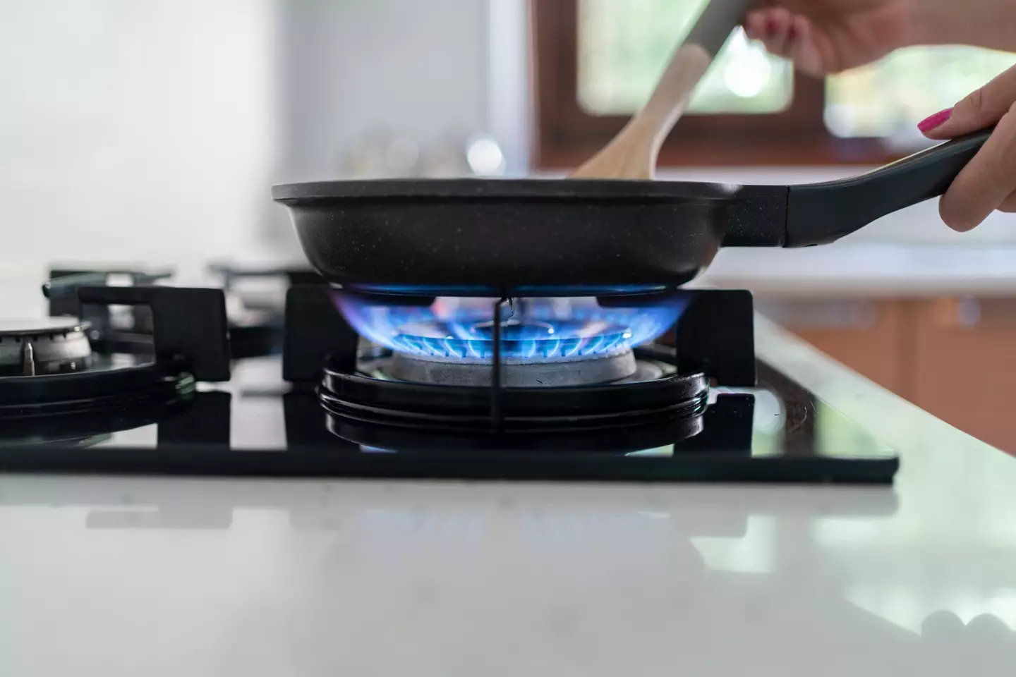 Cooking on a gas stove releases benzene into the air, a known carcinogen (Getty stock)