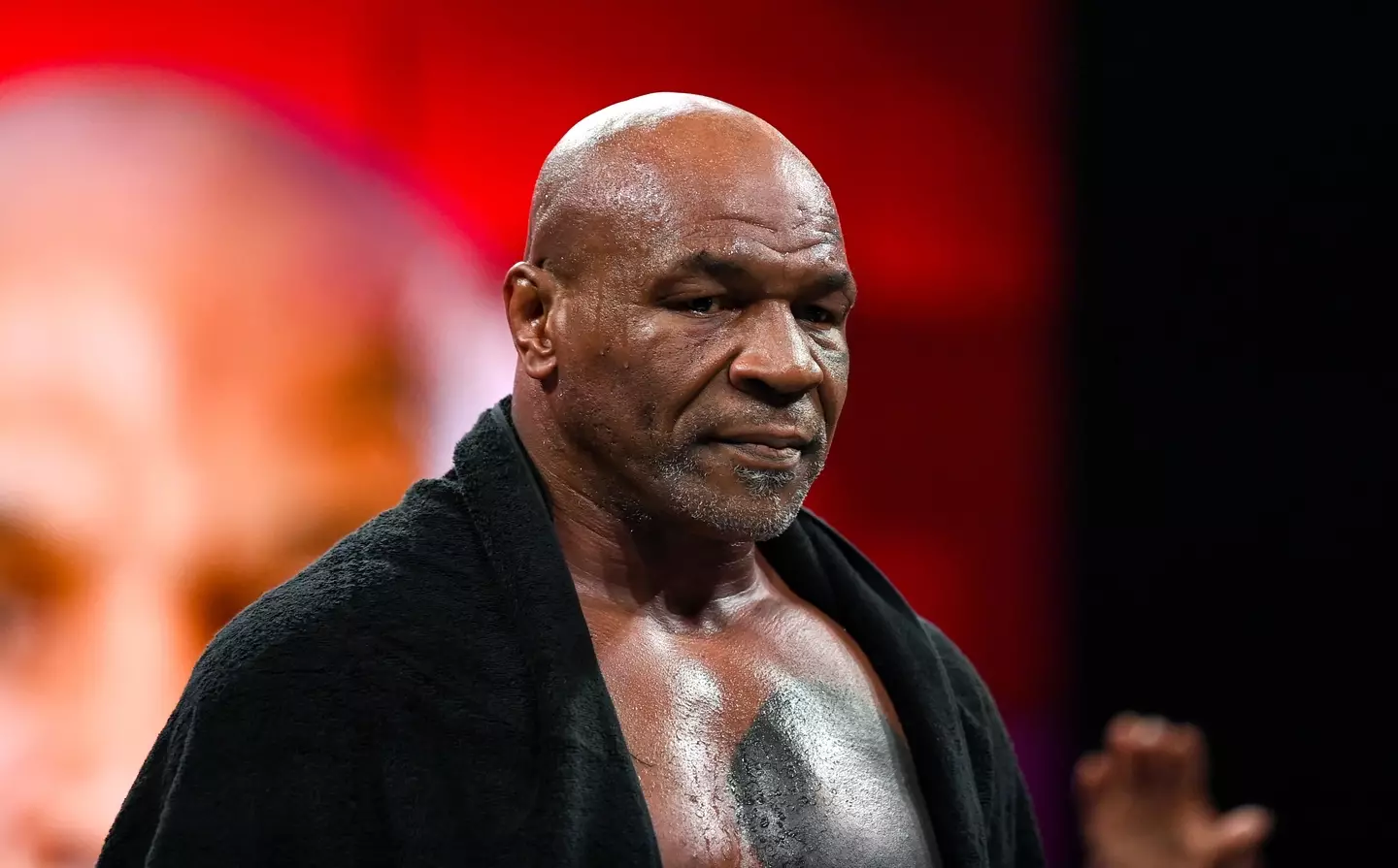 Mike Tyson enters the ring on Friday (Stephen McCarthy/Sportsfile via Getty Images)