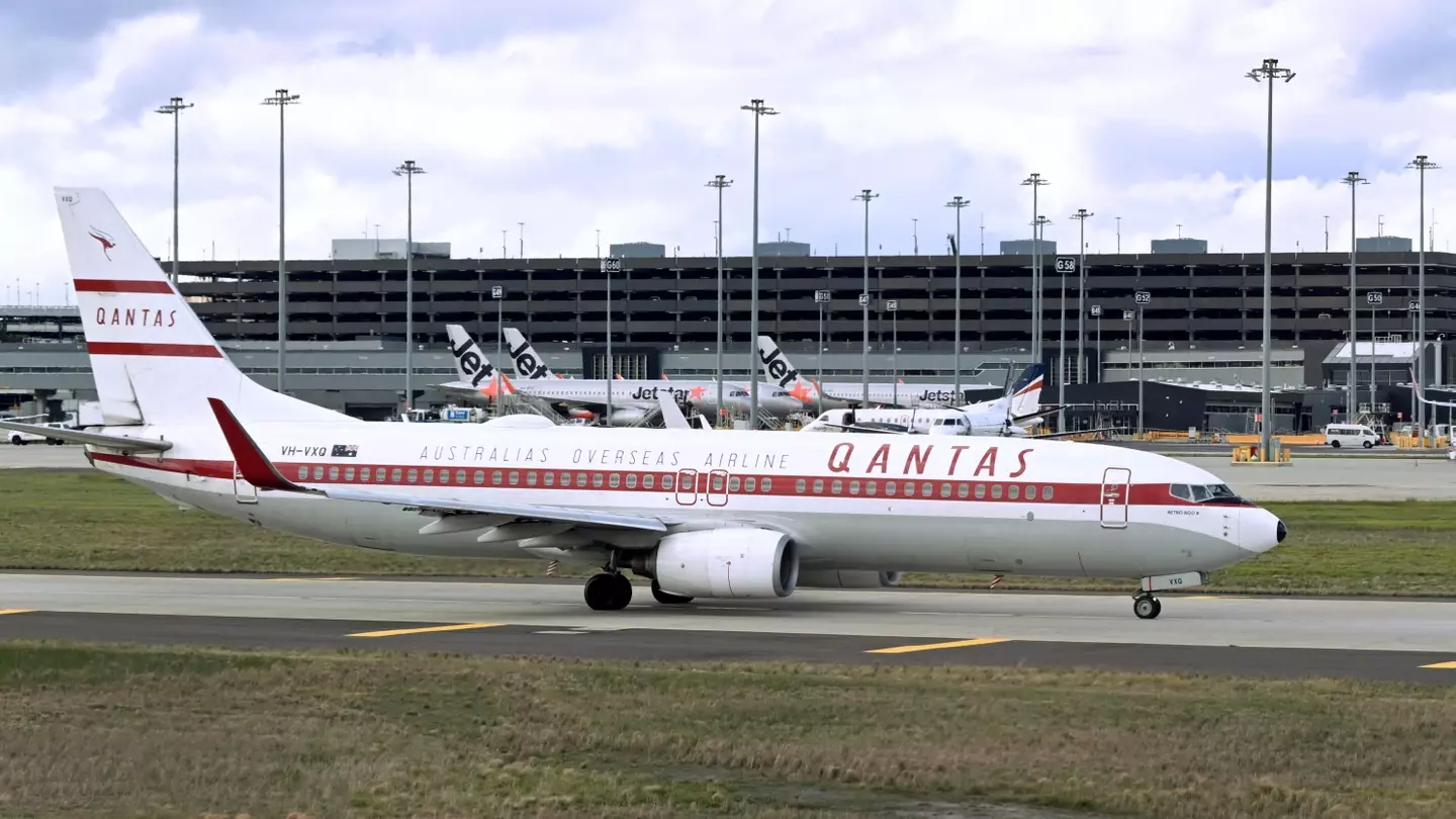 The 24-year-old was on a Qantas plane (WILLIAM WEST/AFP via Getty Images)