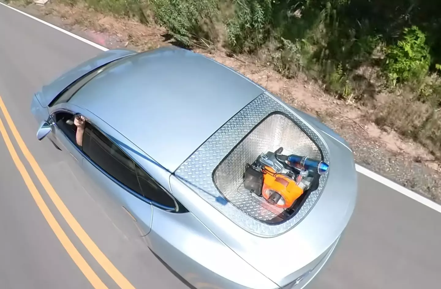YouTuber Matt Mikka added a gas generator to his Tesla to see if he could take it on a road trip.