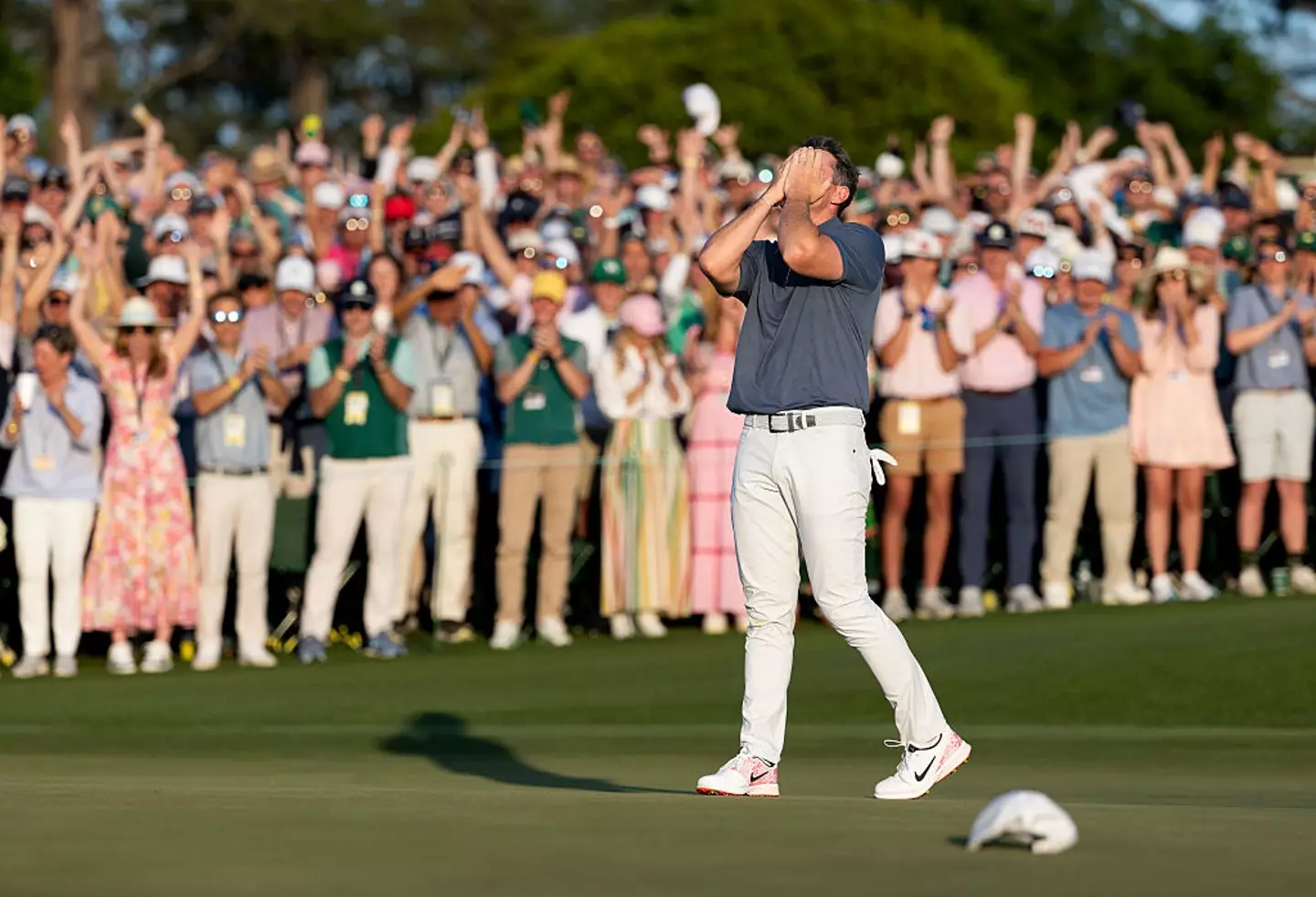 The champion golfer was understandably overcome with emotion (Simon Bruty/Augusta National/Getty Images)