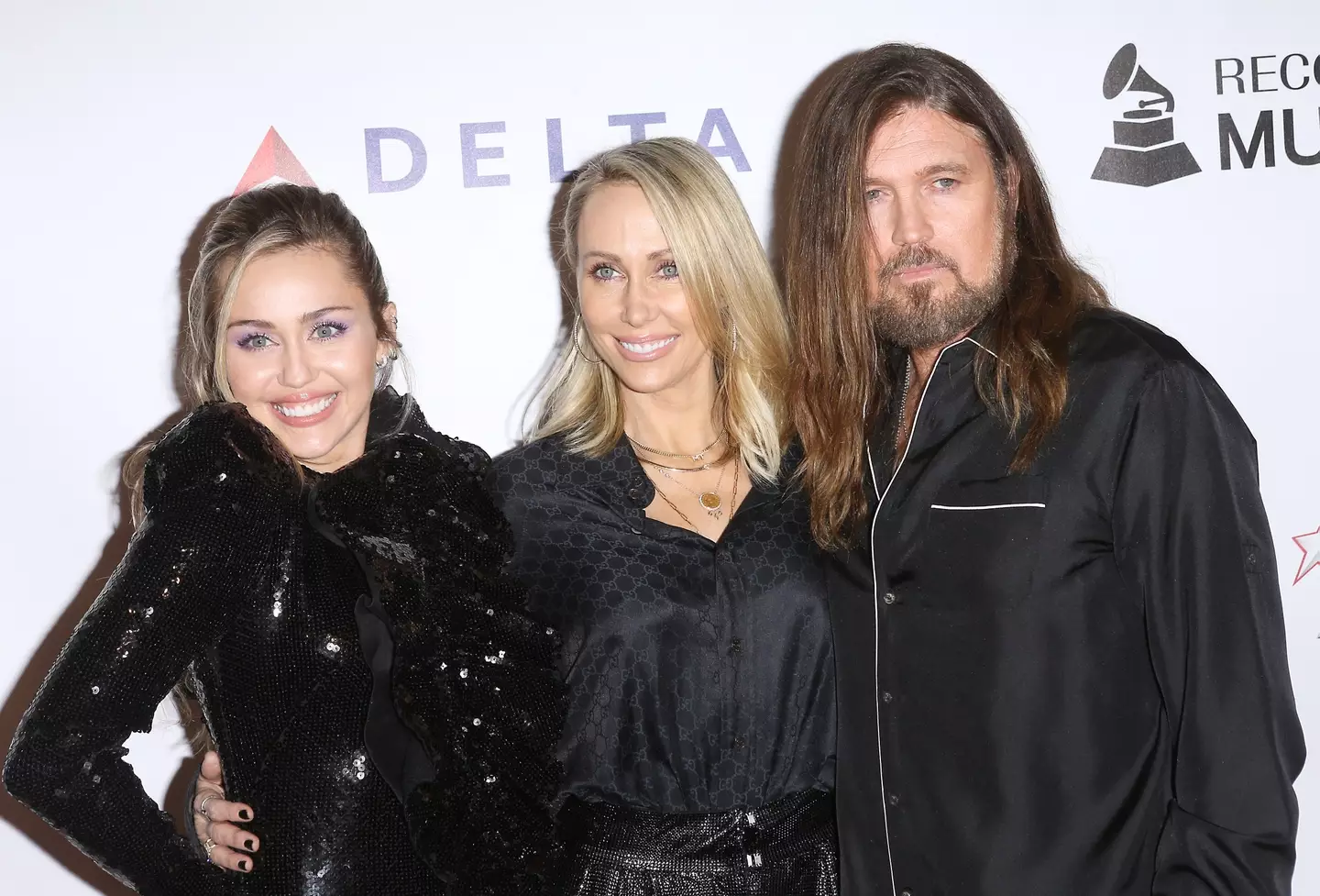 Miley Cyrus pictured with her parents, Tish and Billy Ray Cyrus.