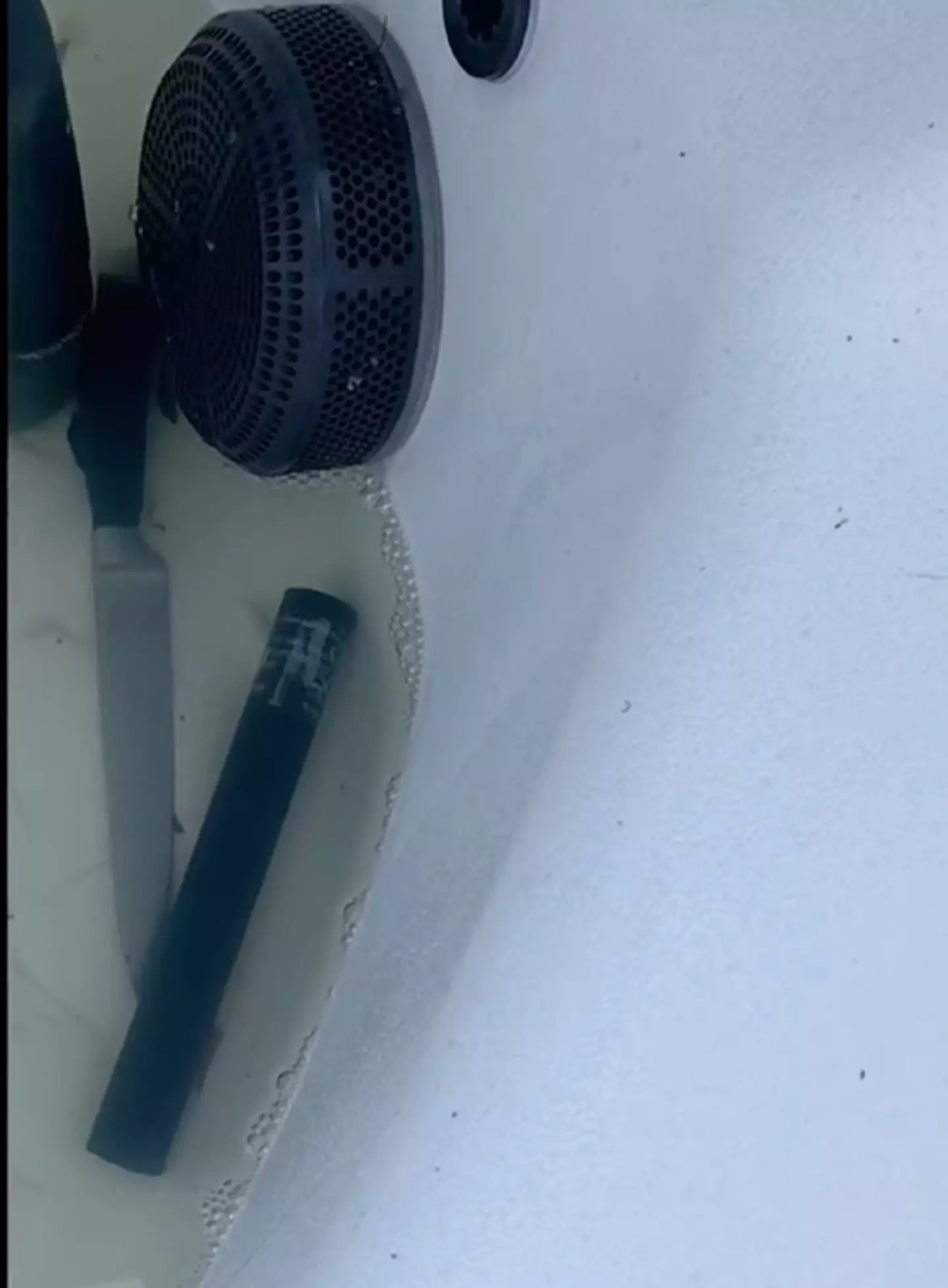 The mom found a knife in the hot tub.