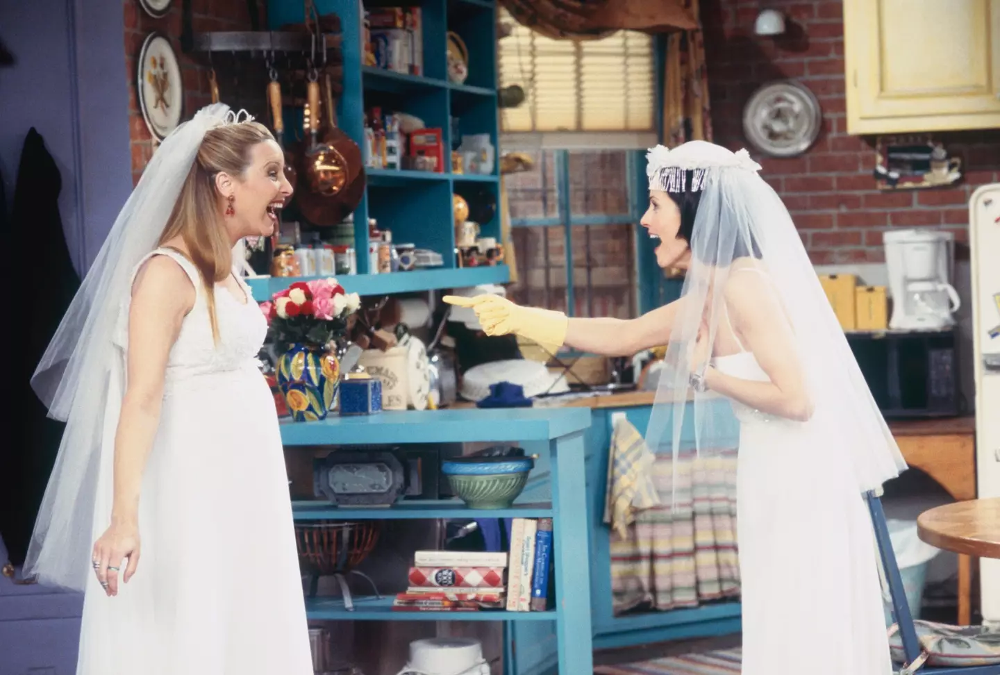 Elsewhere, Phoebe and Monica also stun in wedding dresses. (Gary Null/NBCU Photo Bank/NBCUniversal via Getty Images via Getty Images)