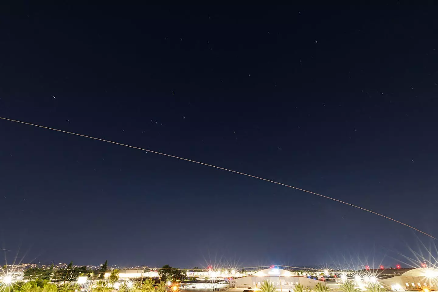 SpaceX's Dragon capsule coming in to land (Patrick T. Fallon / AFP via Getty Images)