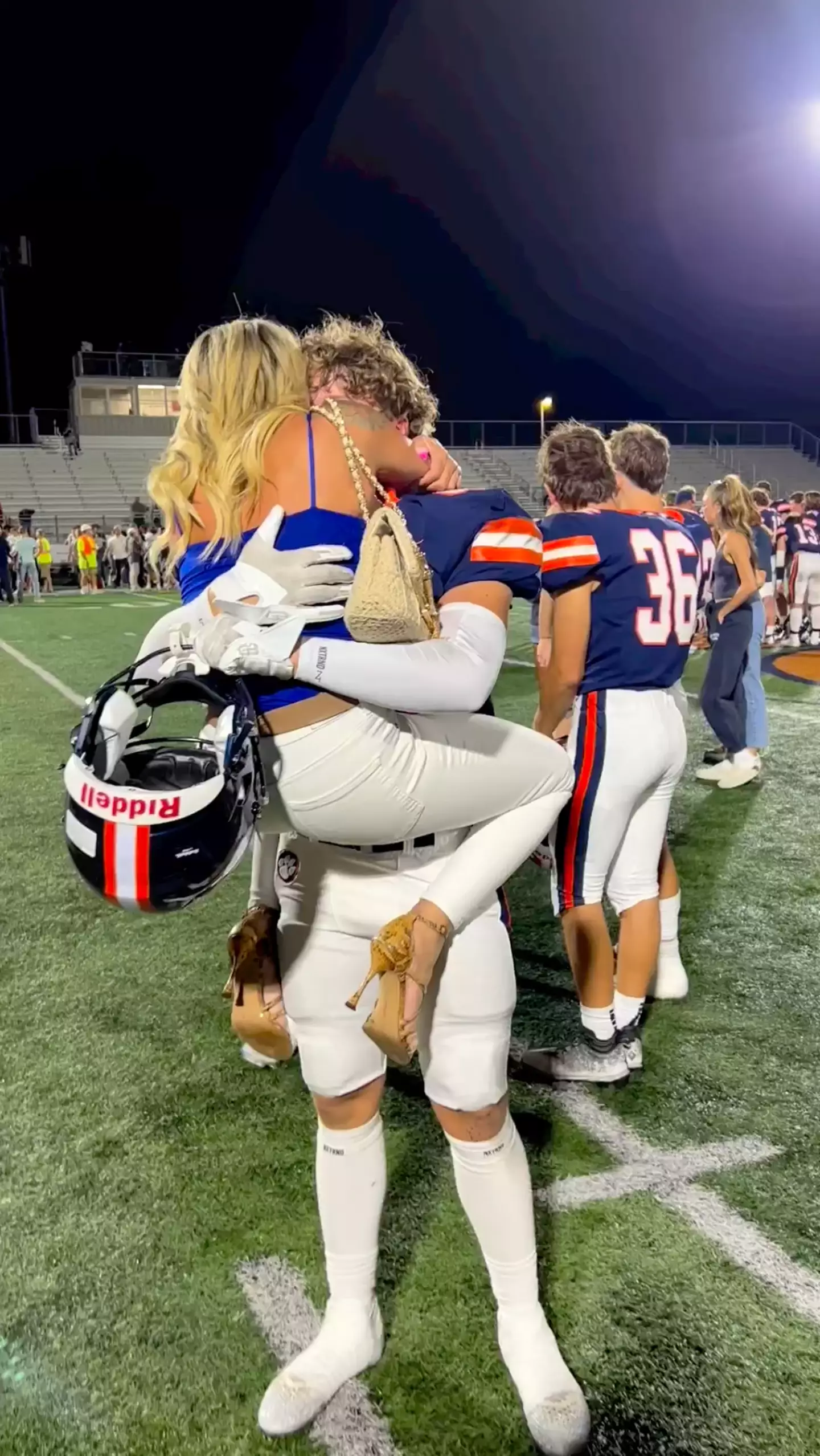 Amber hugged her son after the game.