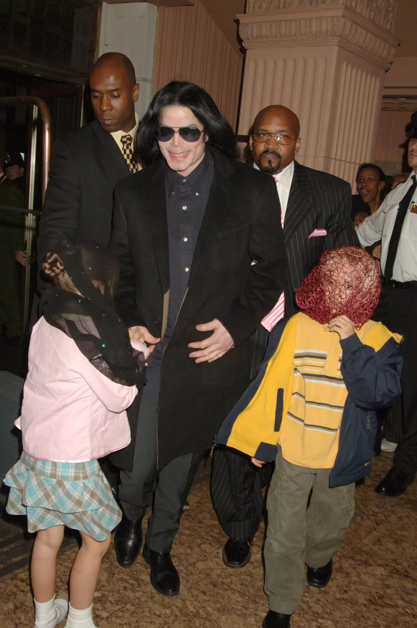 Michael Jackson pictured with two of his children.