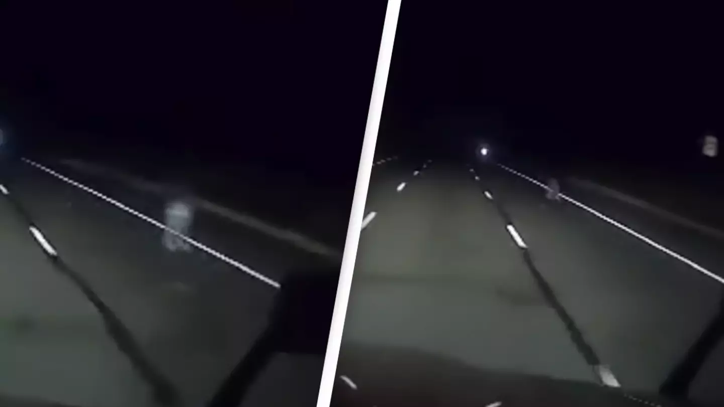 Terrifying moment ‘ghost’ appears in the middle of highway while trucker drives alone