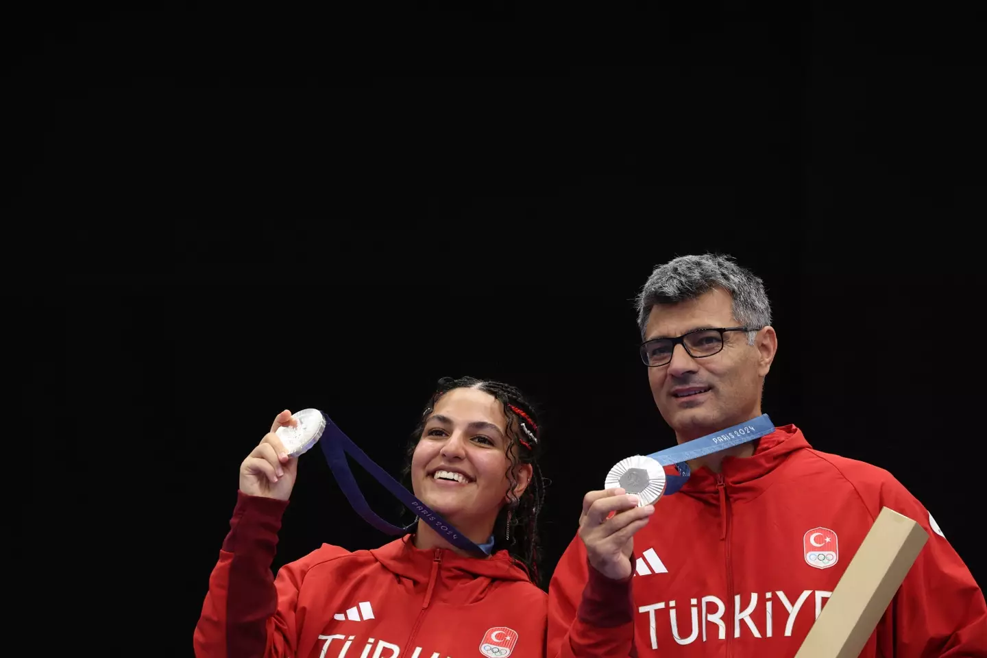 Turkish Olympic silver medallists Sevval Ilayda Tarhan and Yusuf Dikec. (ALAIN JOCARD/AFP via Getty Images)