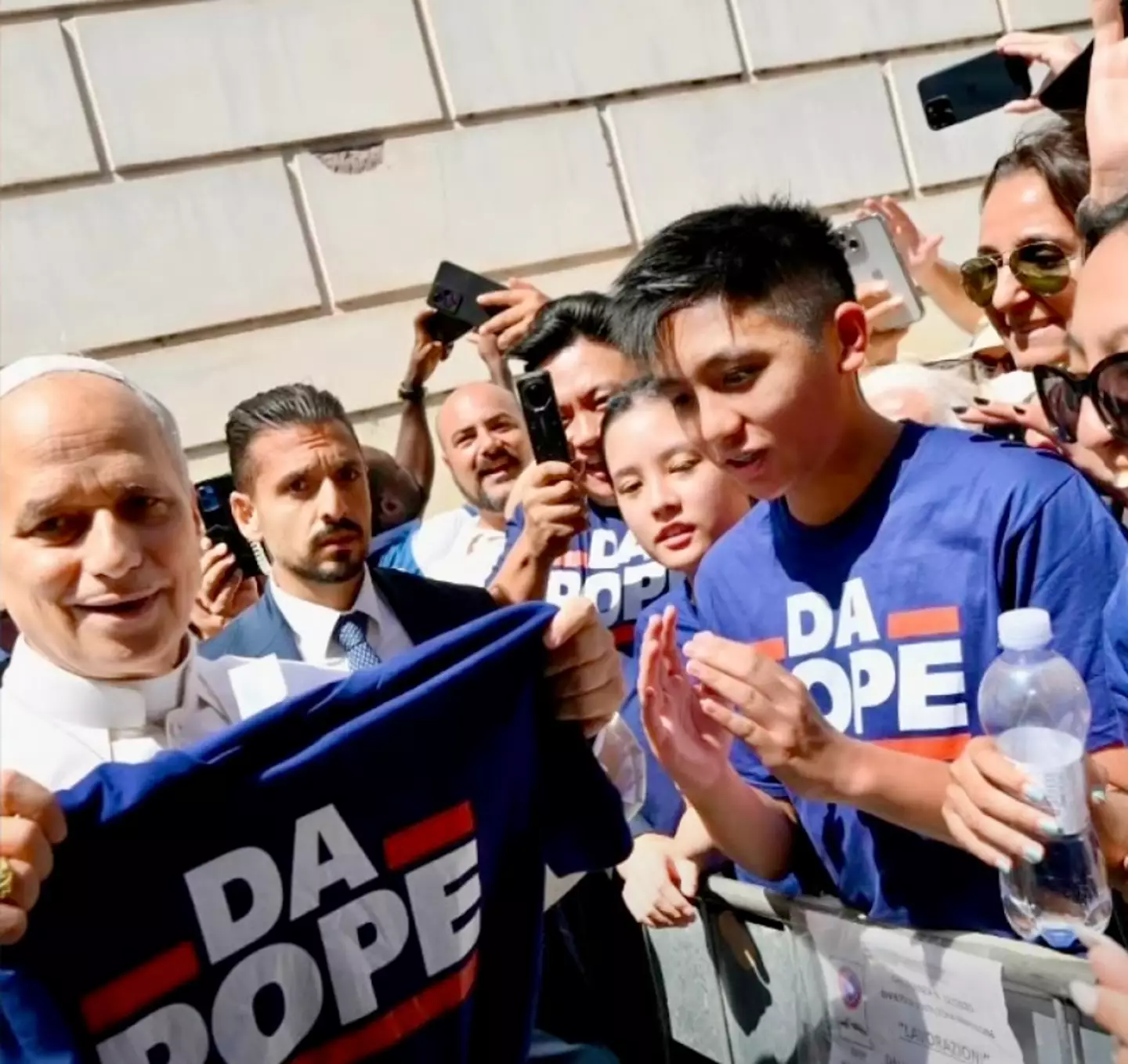 The pope accepted the gift after spotting the Americans in the crowd