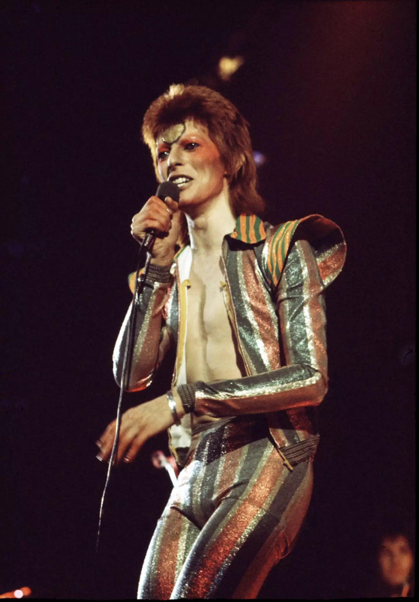 David Bowie performing as Ziggy Stardust in 1973 (Michael Putland/Getty Images)