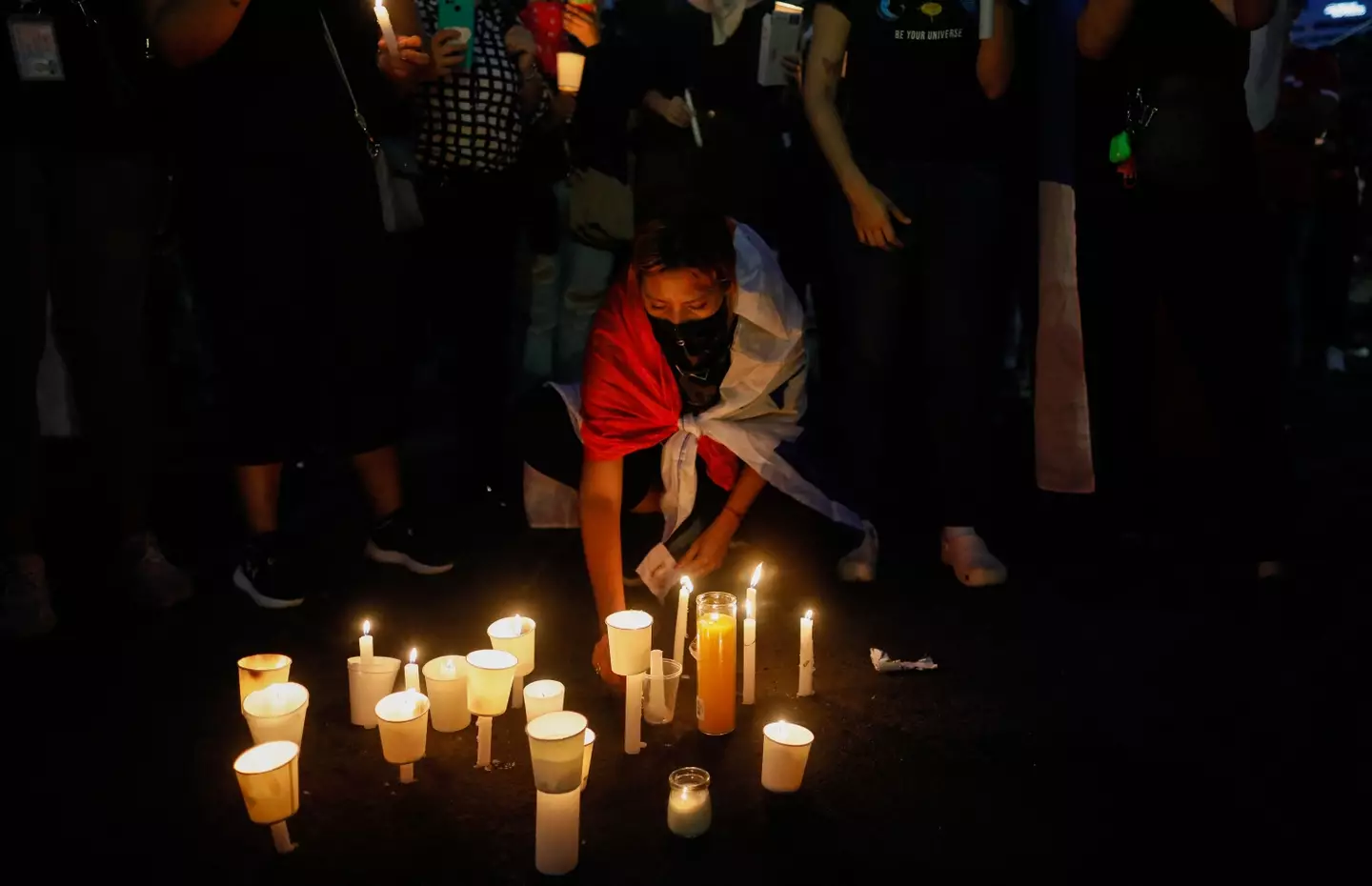 Protesters held a vigil for the two who died.
