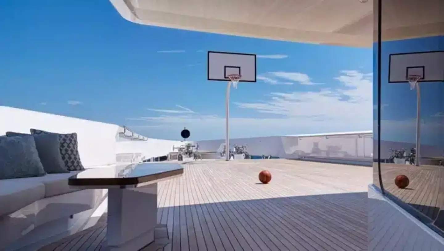 Of course the yacht has a basketball court!