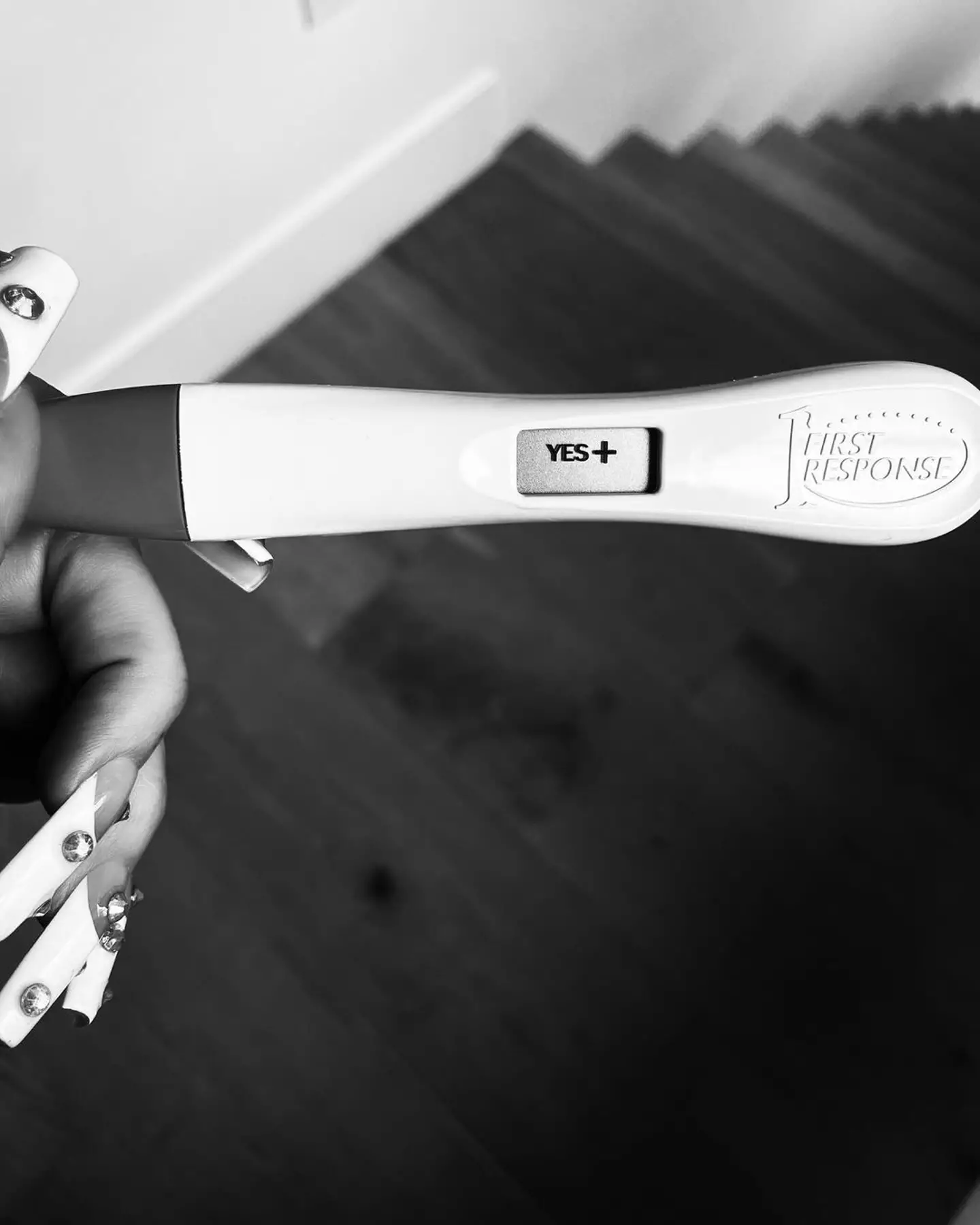 The 38-year-old actress shared a photo of a positive pregnancy test on Instagram (meganfox/Instagram)