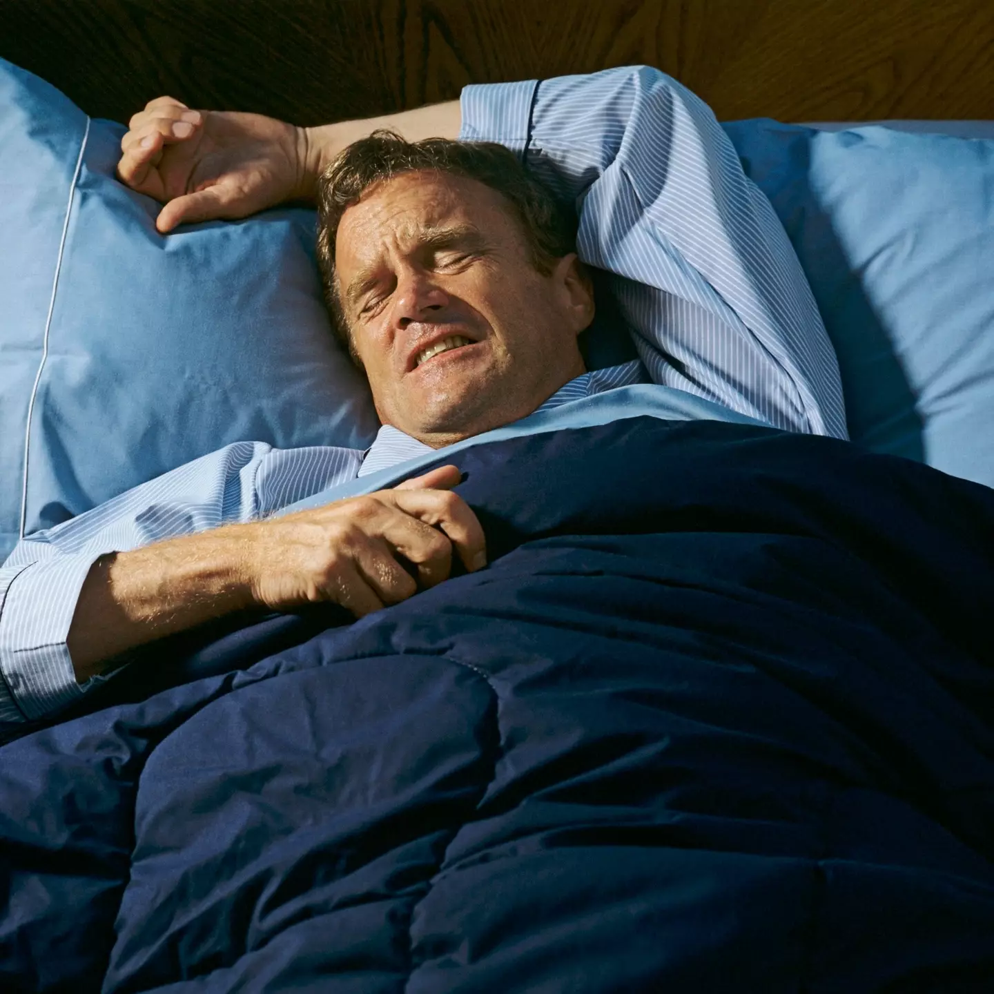 The face of a man not getting enough good sleep (Getty Stock Image)