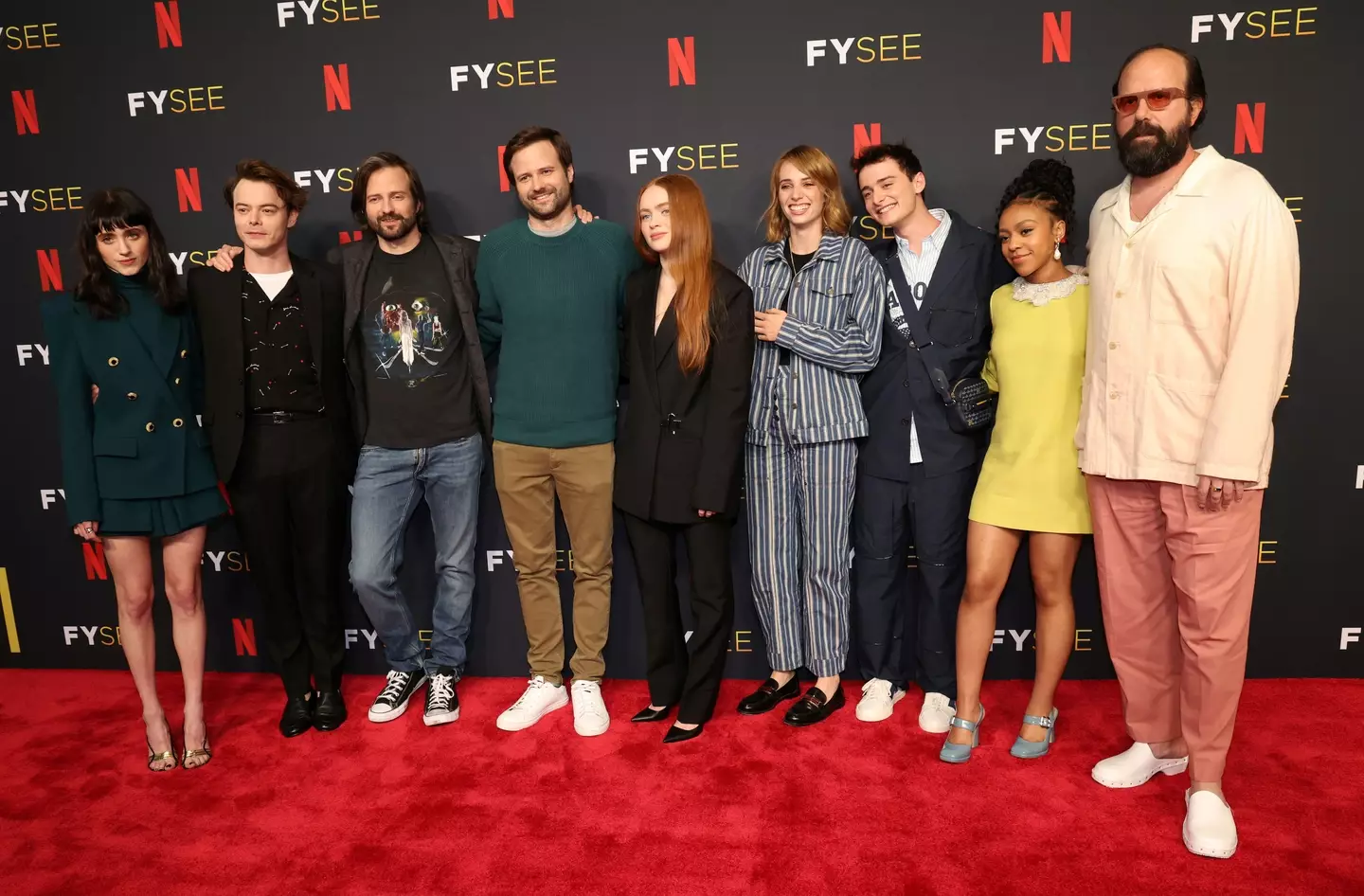 The Duffer brothers and some Stranger Things cast members.