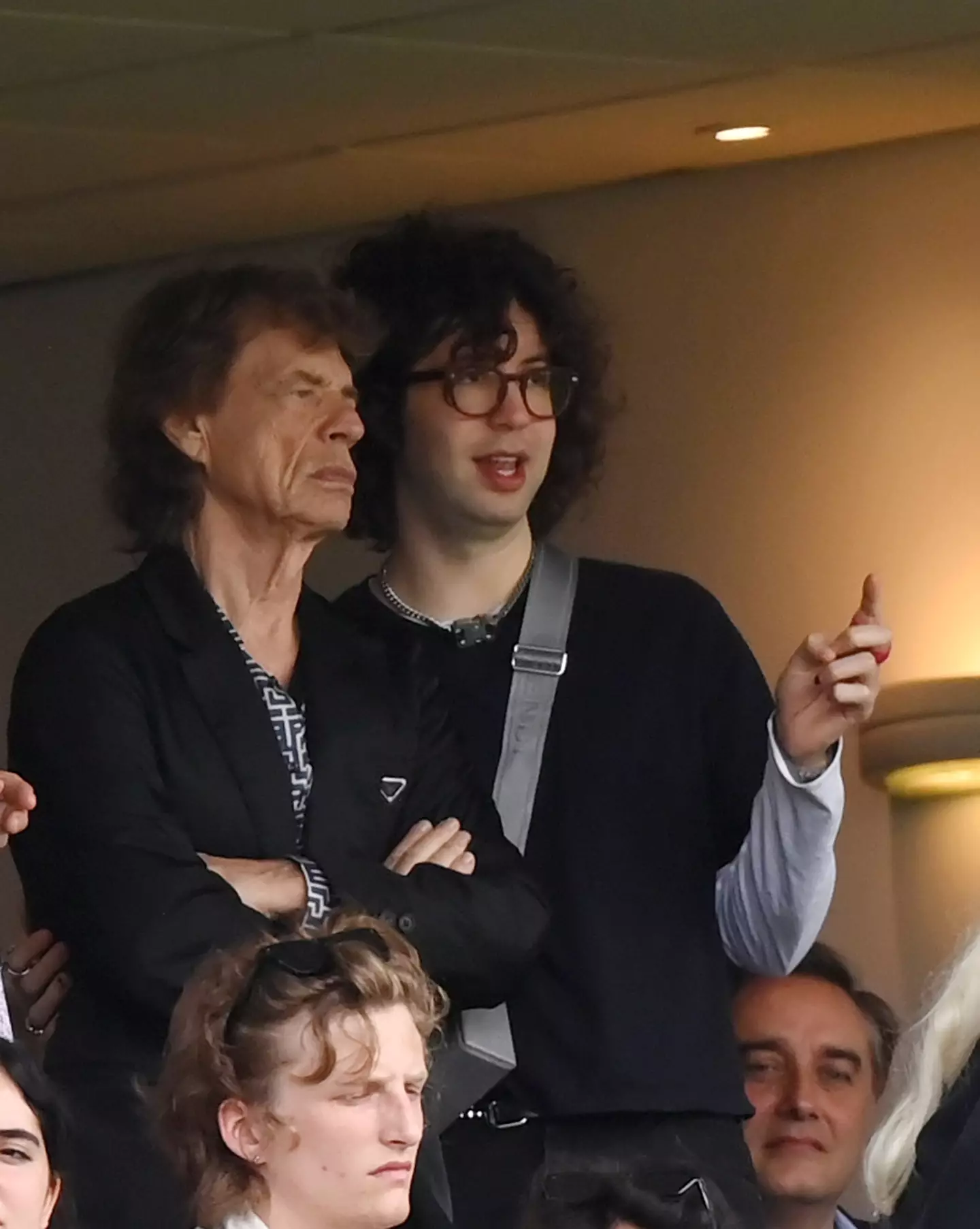 Mick Jagger and his son, Lucas.