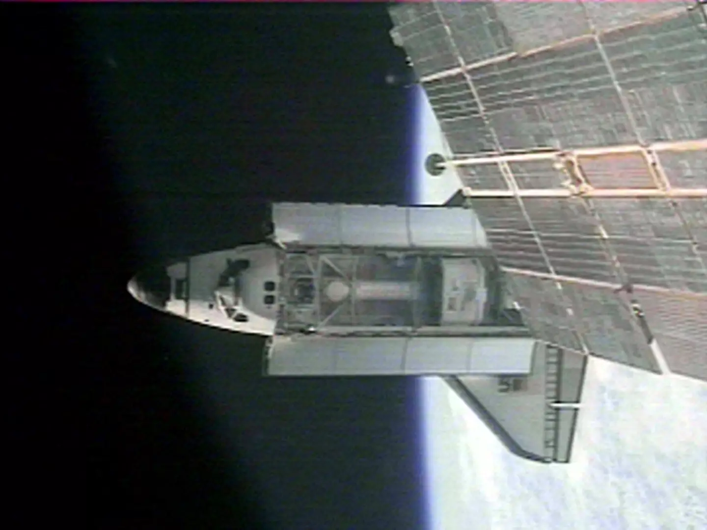 The space shuttle docking at the ISS.