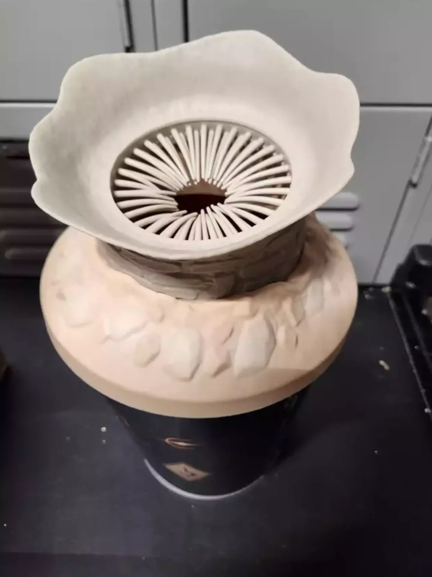 The bucket is meant to represent a worm's mouth... right?