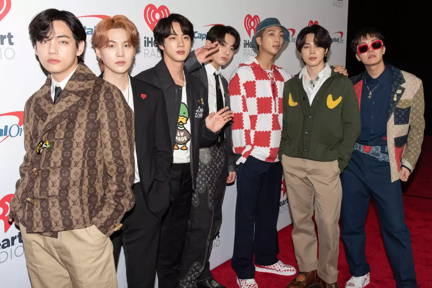 Jin (third from left) and the rest of BTS.