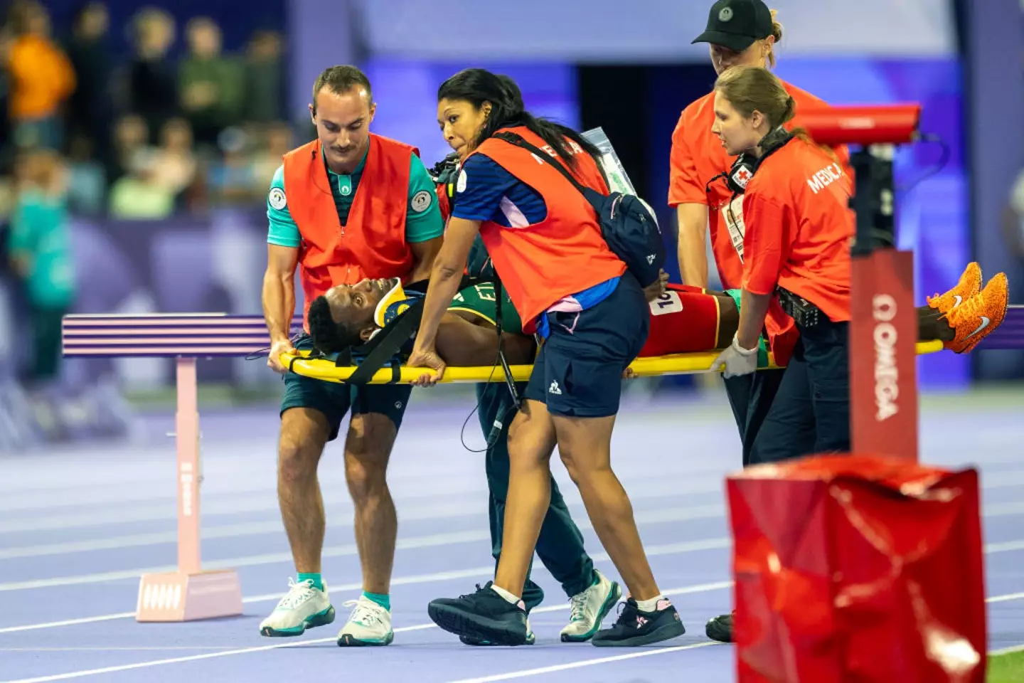 Girma was stretchered out of the Stade De France after taking a tumble. (Tim Clayton/Corbis via Getty Images)