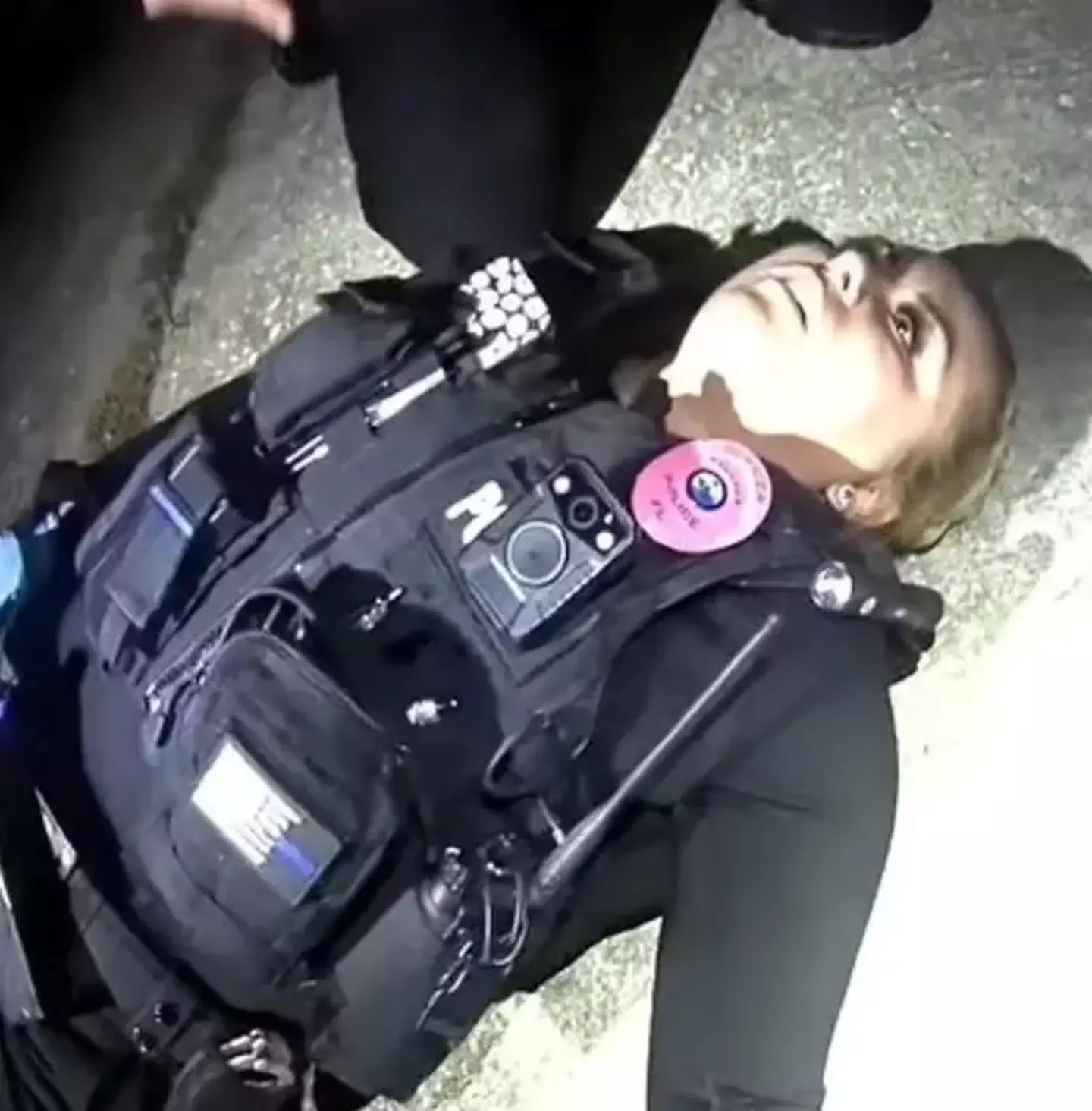 Cops released a clip of Officer Courtney Bannick lying motionless on the side of a road after being exposed to fentanyl.