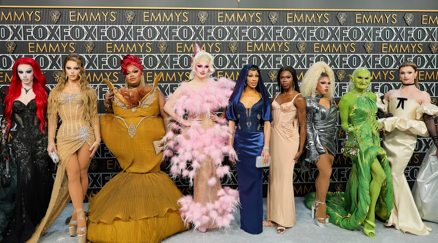 The goblin smiled and posed on the red carpet.