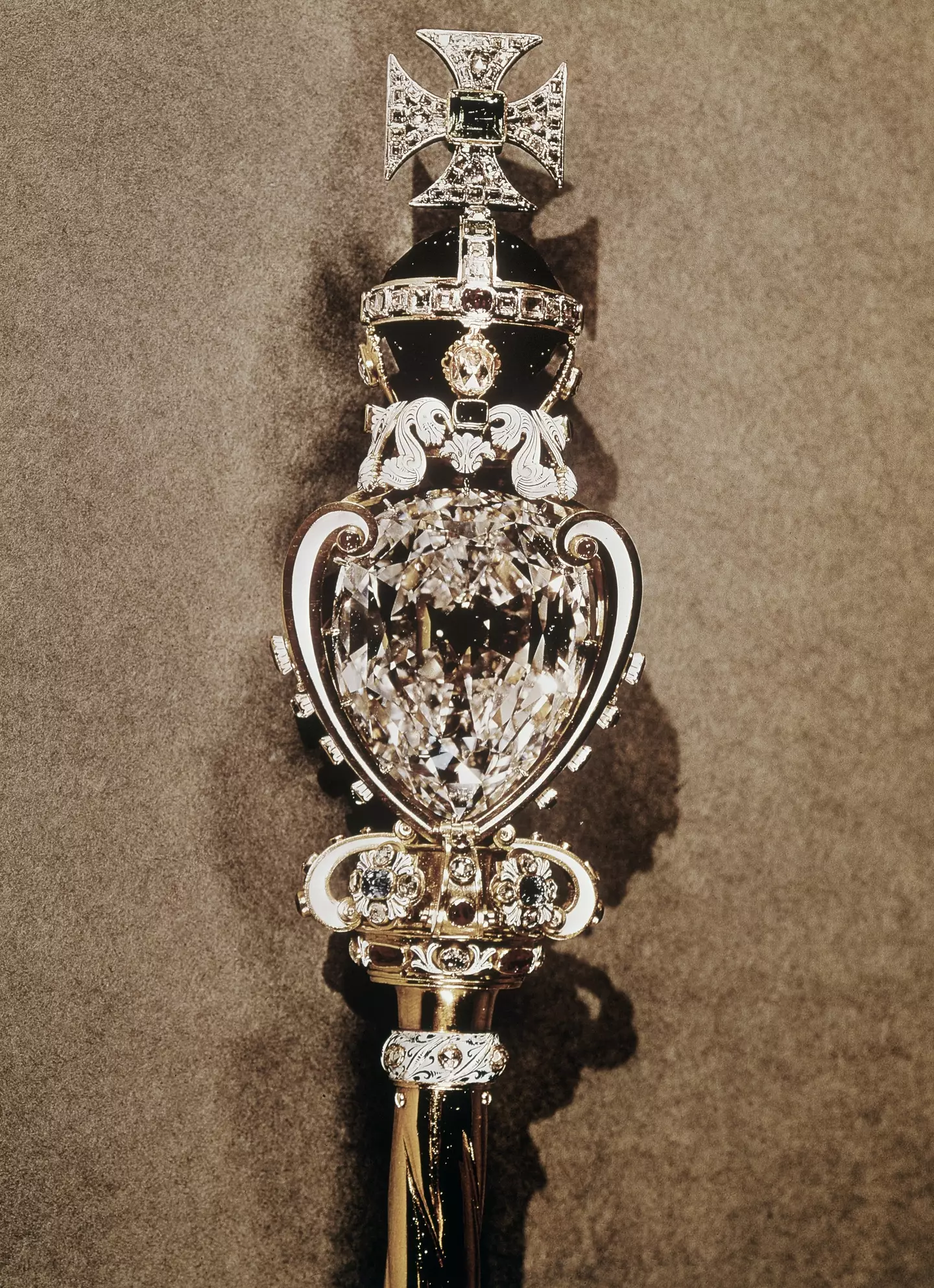 The world’s largest known clear-cut diamond sits on the end of one of the late monarch’s spectres.