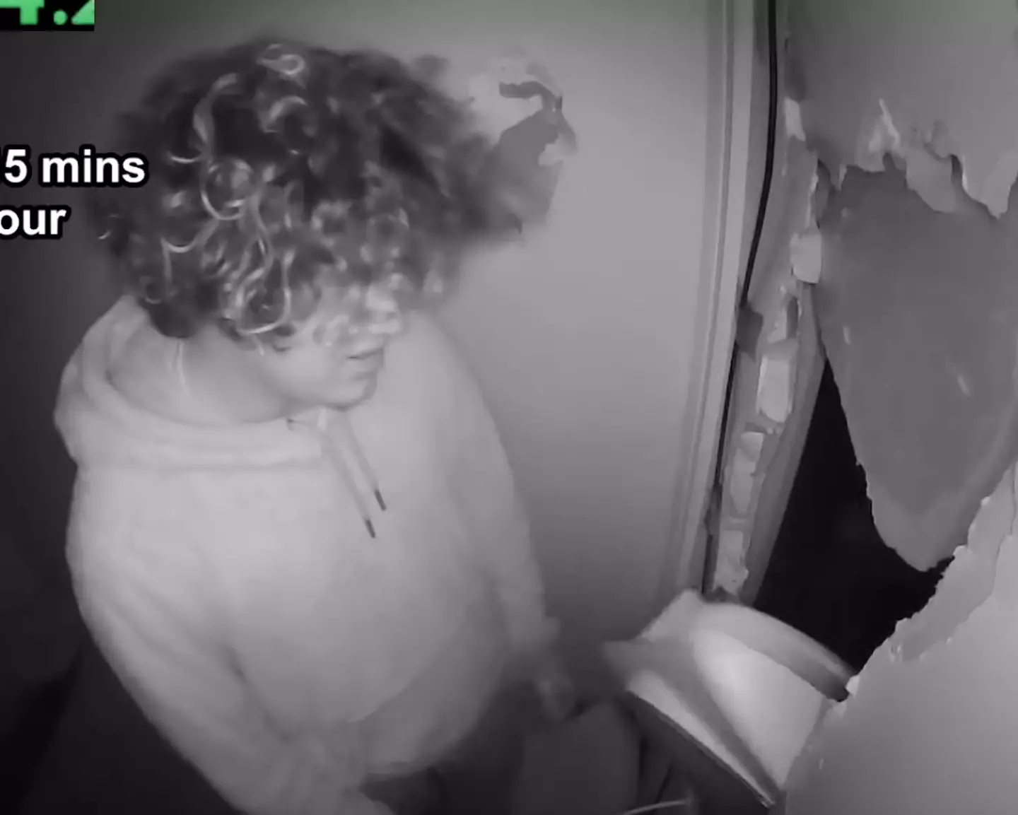 Norme can be seen pacing around the room (YouTube)