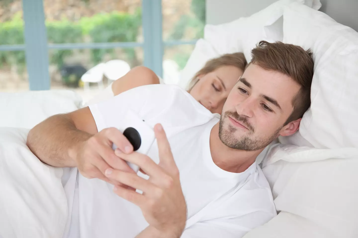 How do you know if your partner really does have wandering hands? (Getty Stock Images)
