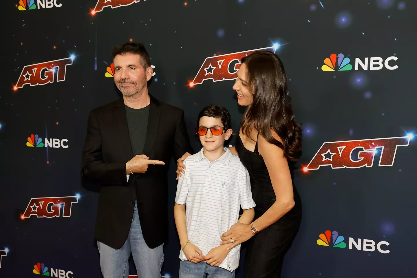 Eric took to the carpet with his parents.