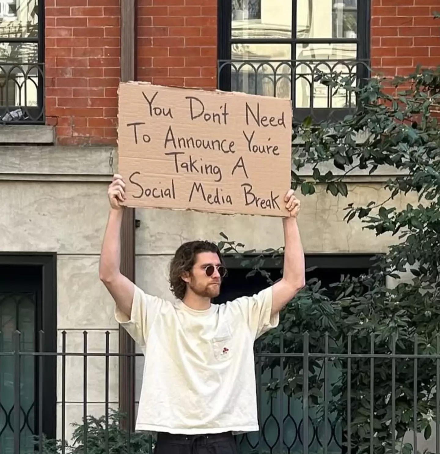 Phillips has called for social media users to take a digital detox, backing Heineken's campaign (Instagram/dudewithsign)