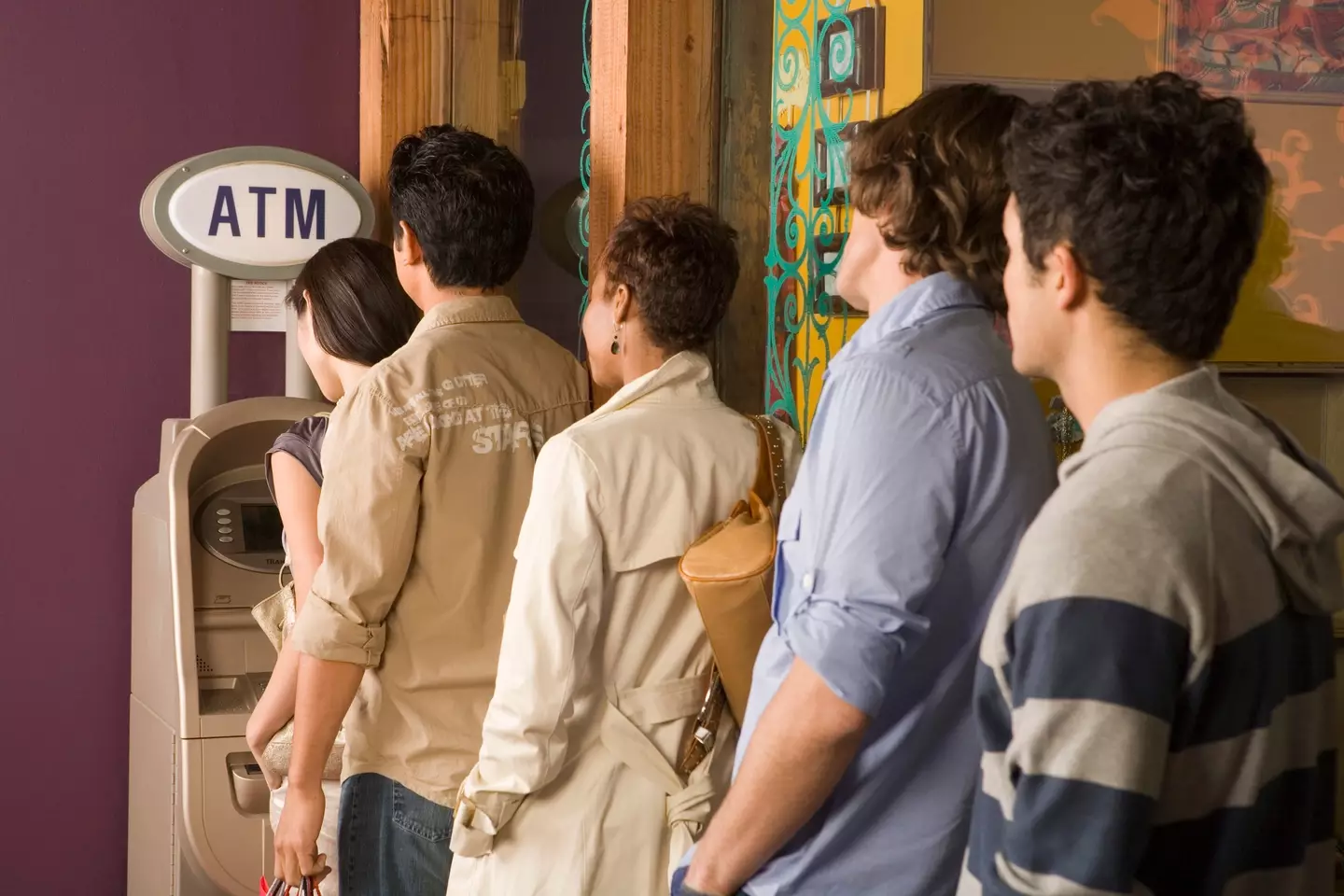 Imagine taking cash out of an ATM and everyone waiting behind you can see just how much you have in your account. (Getty Stock Image)