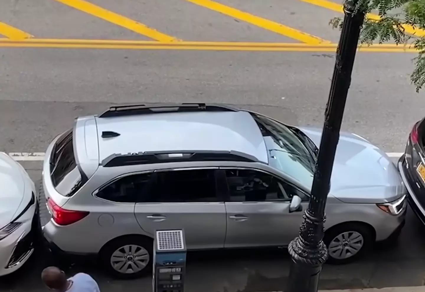 You can barely see a gap between the cars.