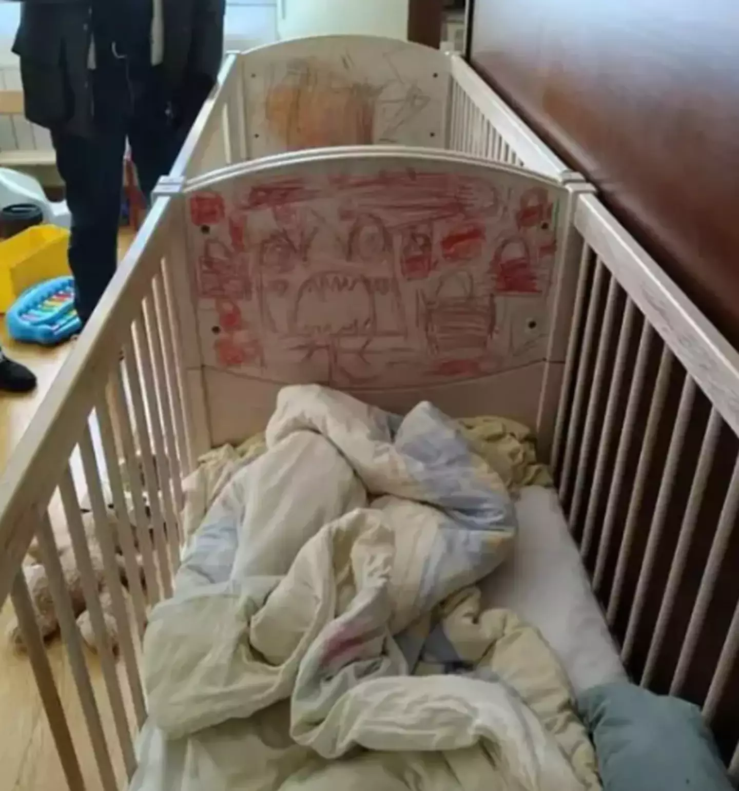 The children were made to sleep in cots (Police handout)