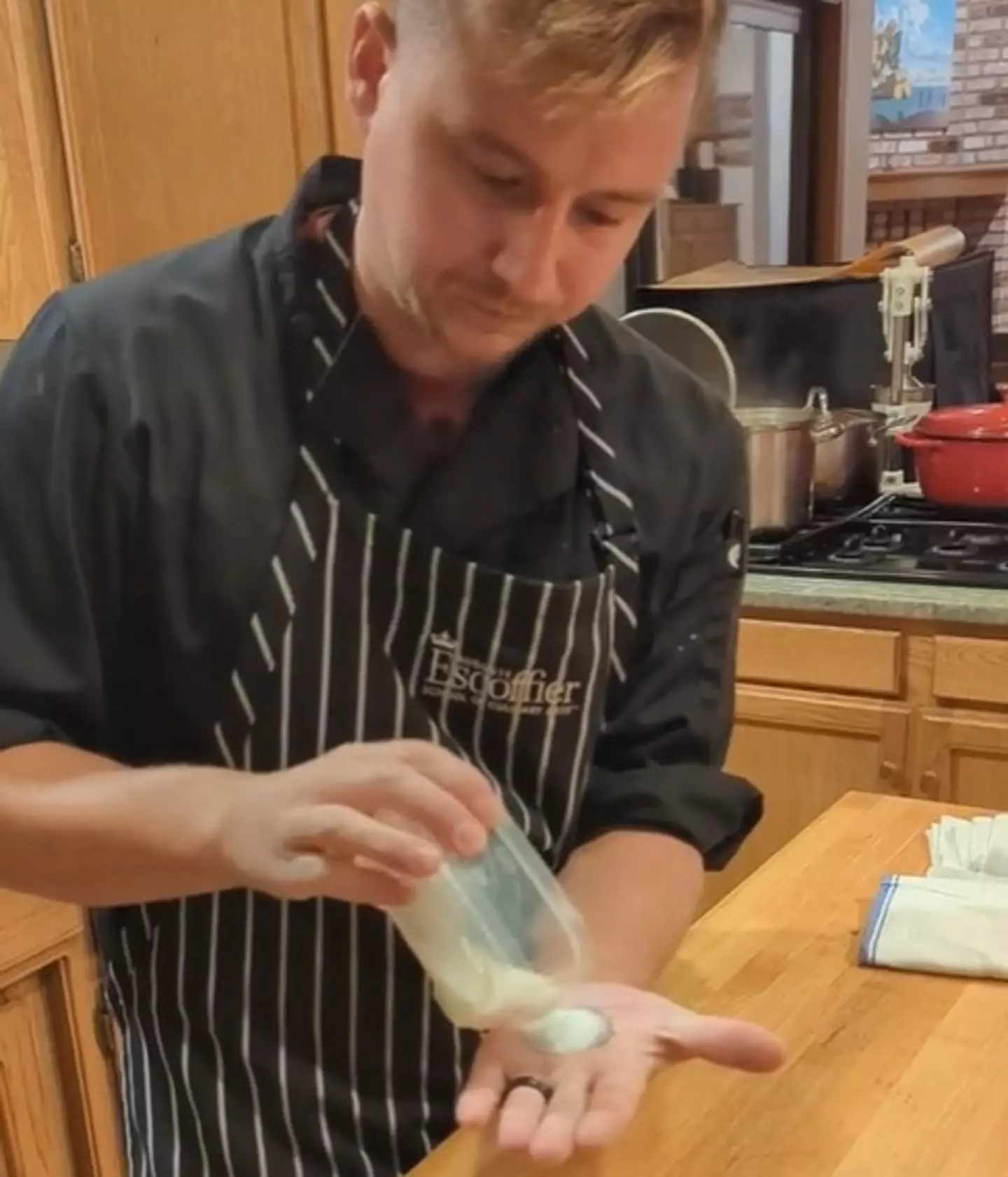 Bryce Norblom uses his hand tattoo to measure out ingredients while cooking..