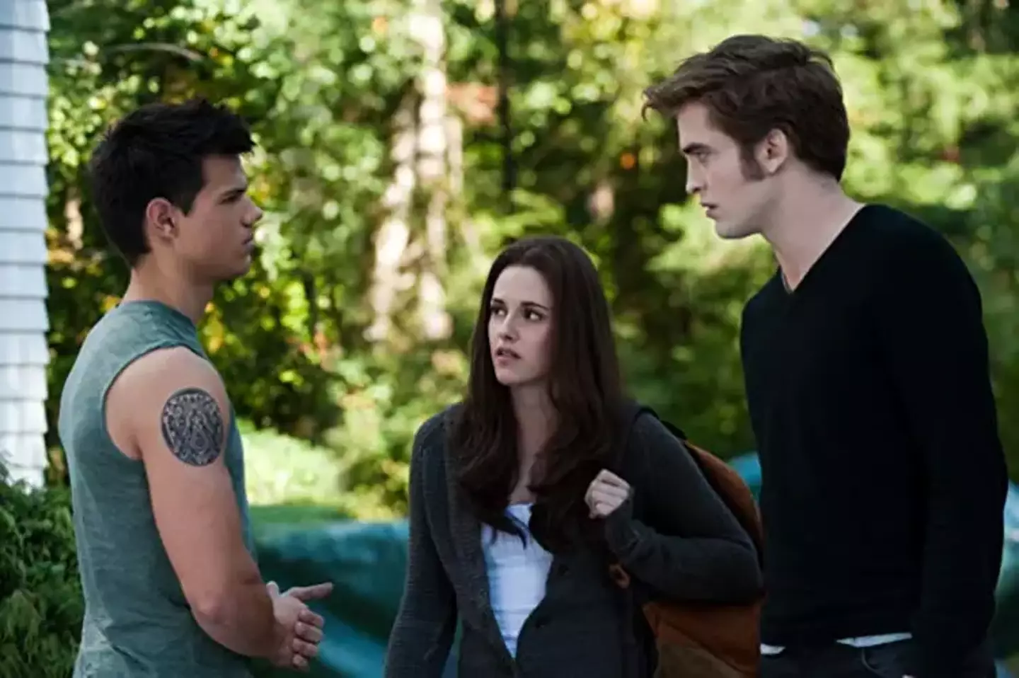 Taylor Lautner alongside Kristen Stewart and Robert Pattinson.