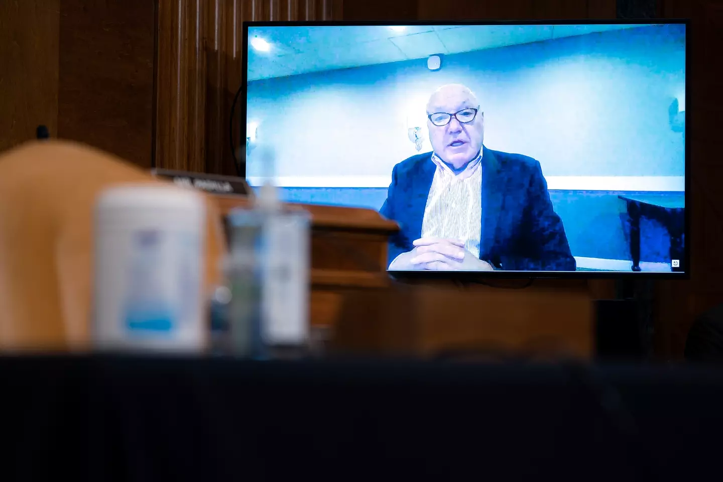 Costco president and CEO Craig Jelinek appears on video link. (Stefani Reynolds-Pool/Getty Images)