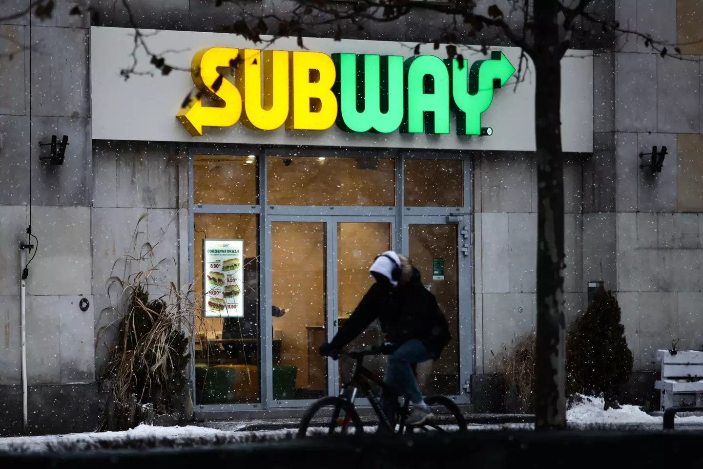 The Subway employee said she was hit in the stomach with the sandwich.