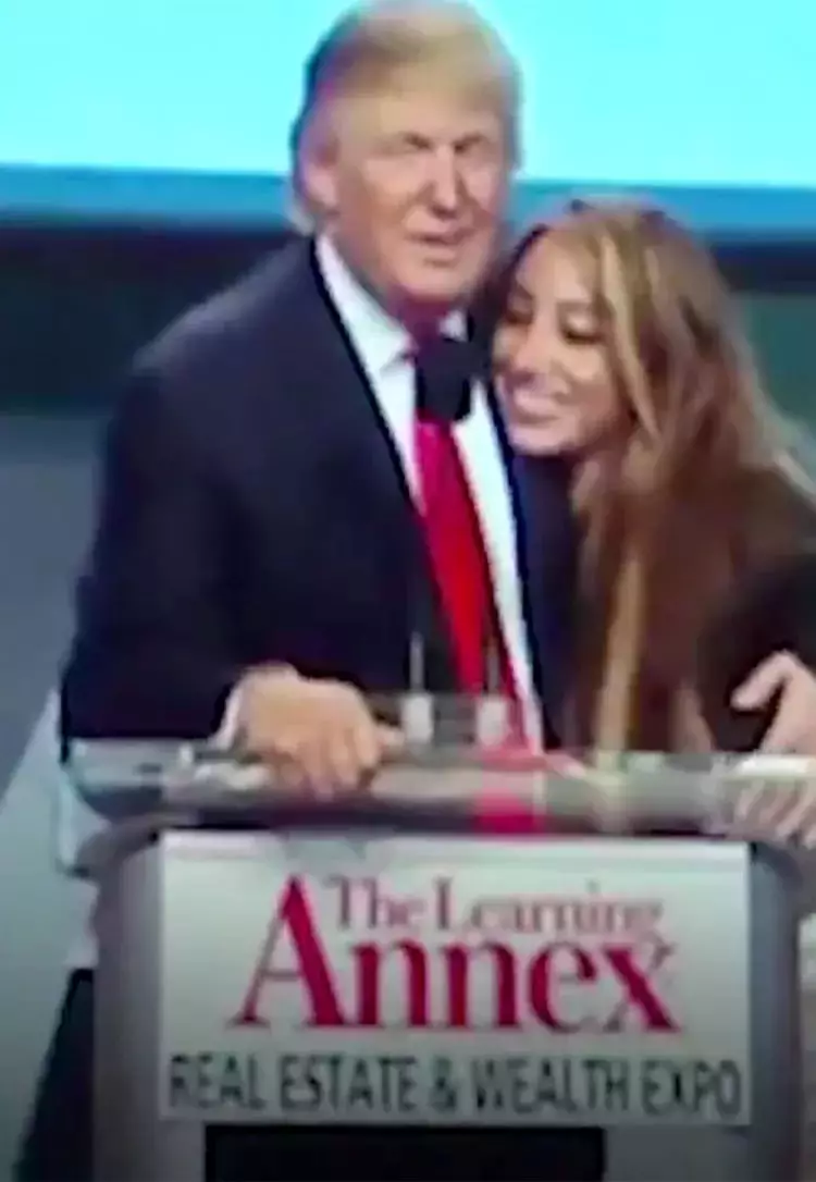 Trump told the story with his arm around a young audience member (Rodney C/YouTube)