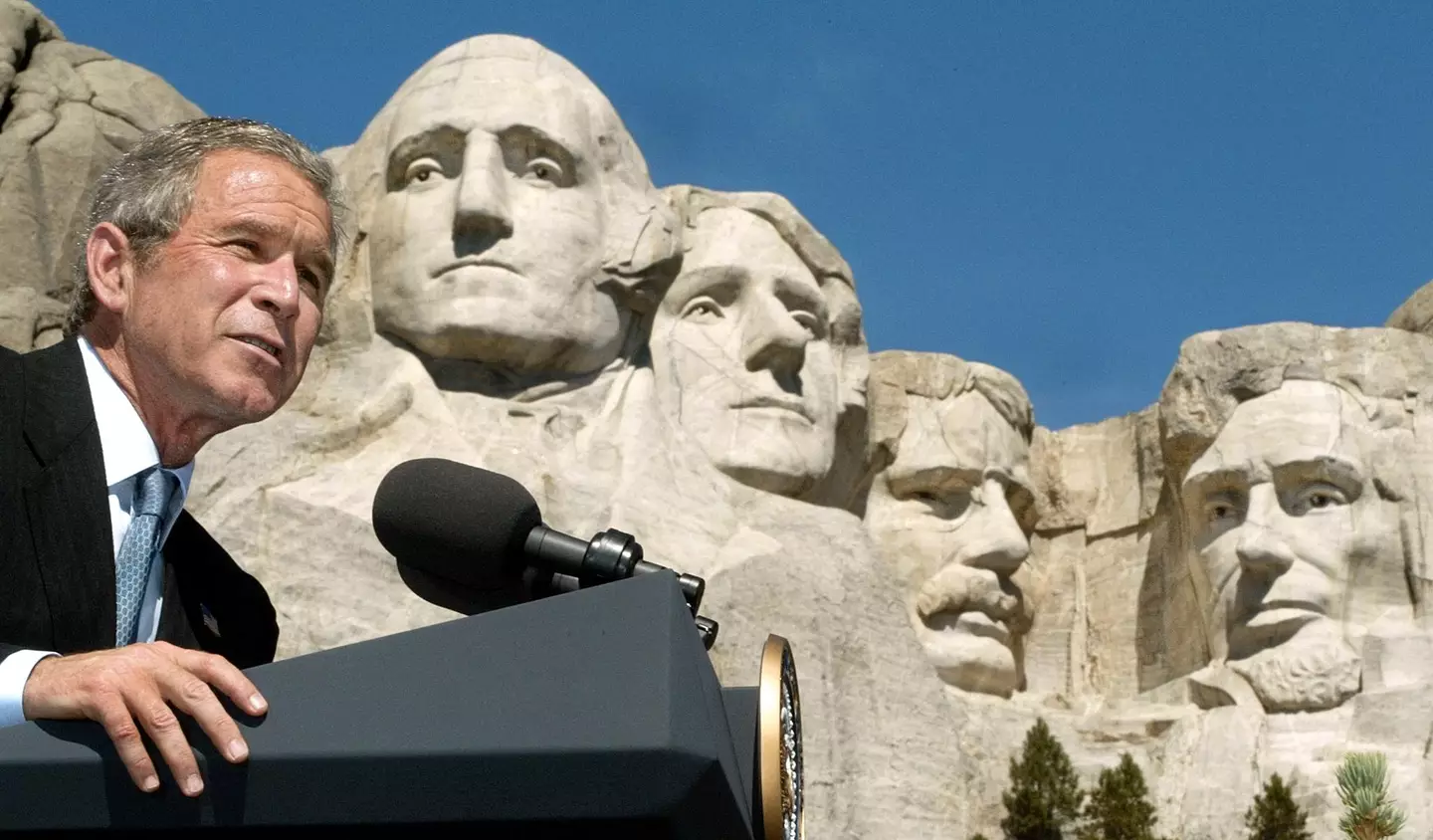 President George W Bush give a speech at Mount Rushmore.