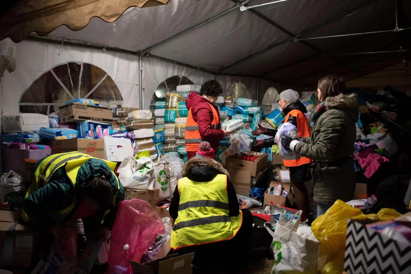 Volunteers sort first necessity goods at the reception point in Przemysl, Poland (Alamy)
