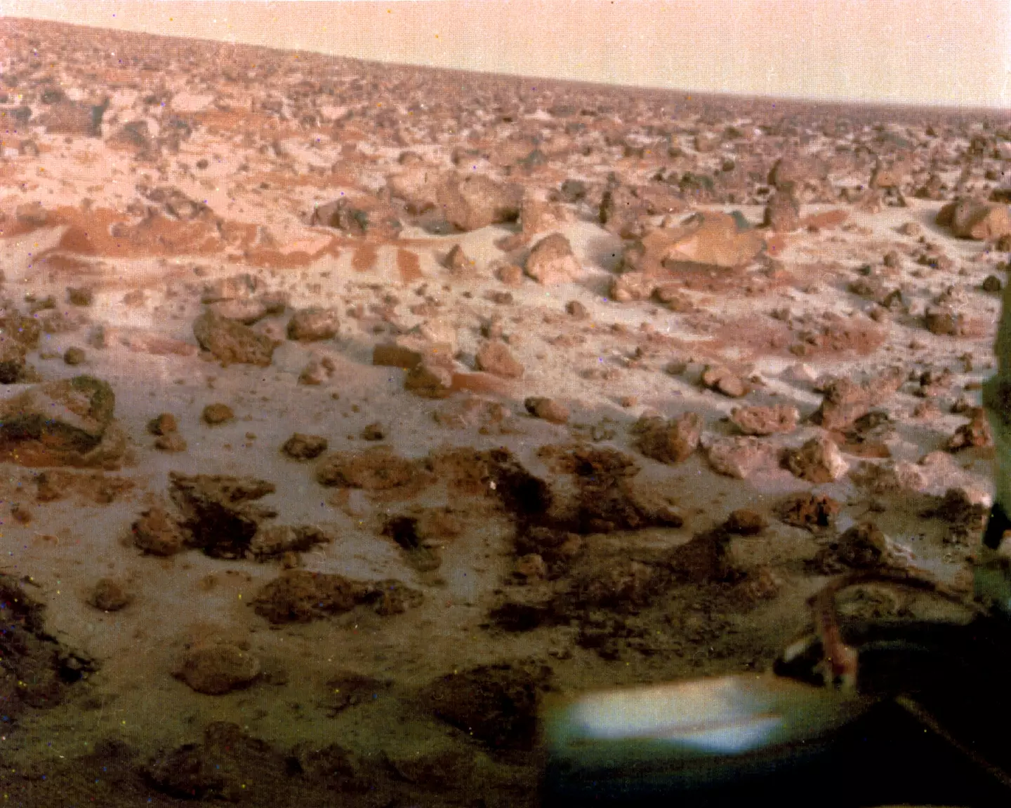 The rover is on the surface of Mars.