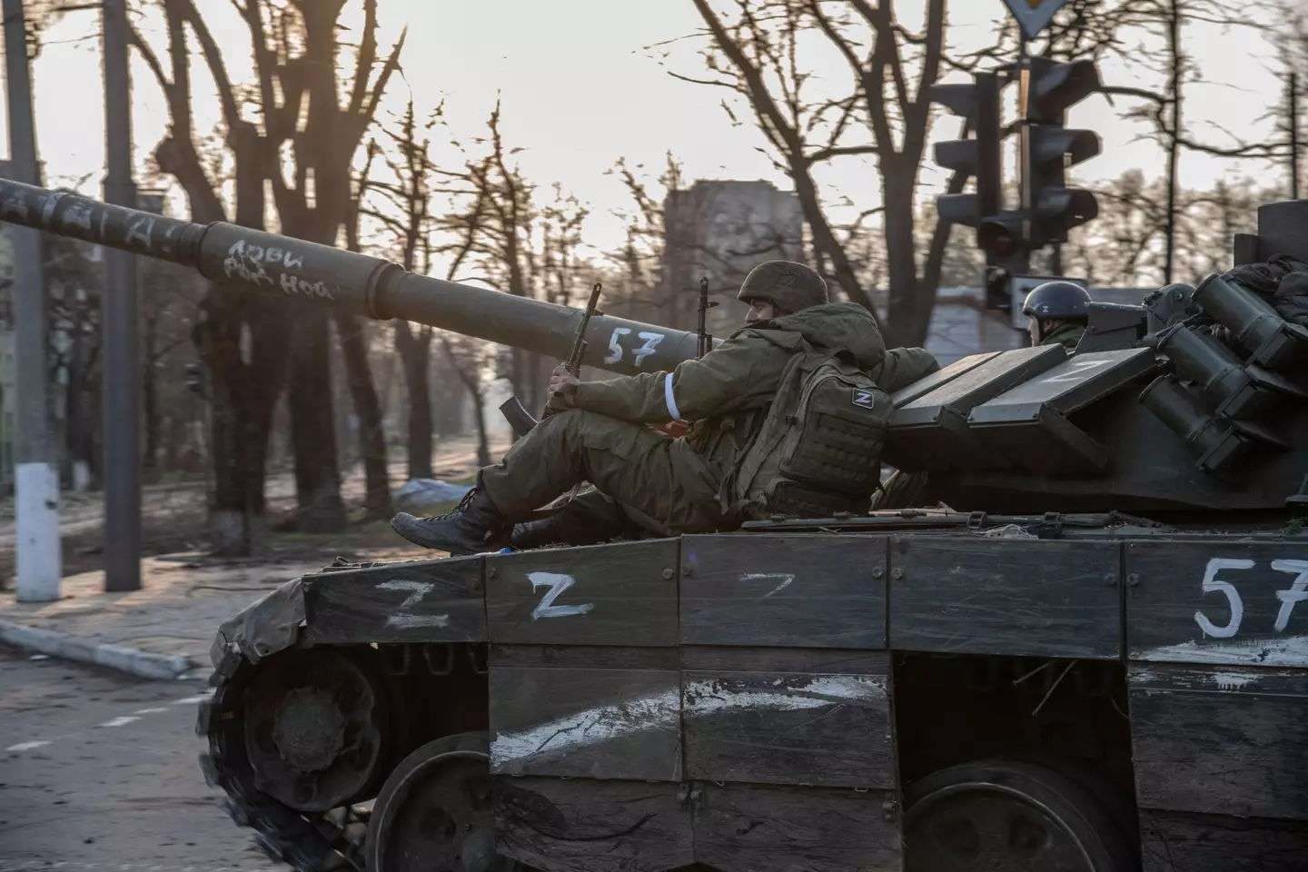 Russian soliders on a tank in Ukraine.