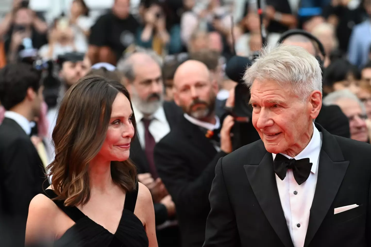 Harrison Ford and Calista Flockhart on the red carpet at Cannes Film Festival.