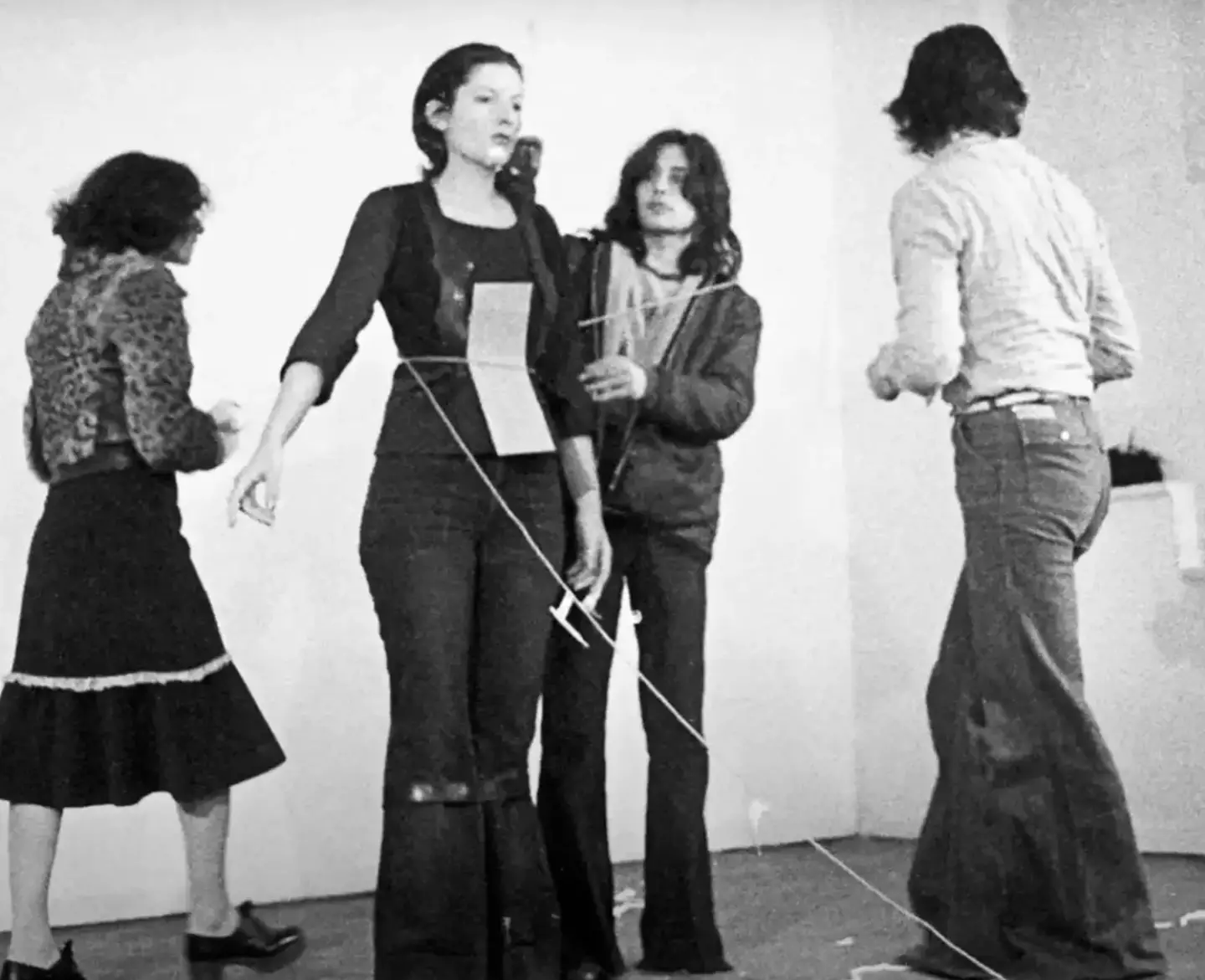 The artist placed everything from flowers to guns for people to use in 'Rhythm 0' (YouTube/Marina Abramovic Institute)