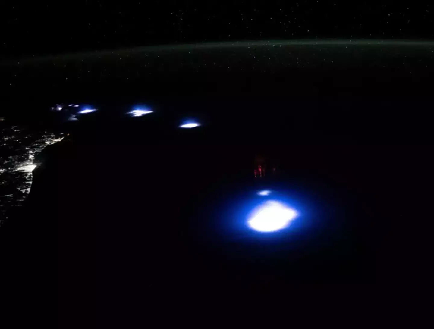 NASA explained that they are called 'red sprites'. (NASA/Matthew Dominick)