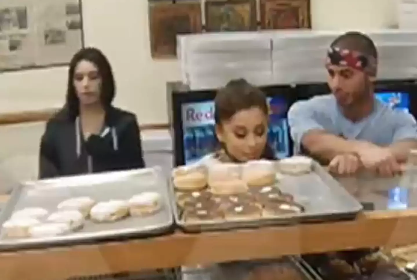 Ariana Grande got caught on camera licking donuts she didn't pay for.