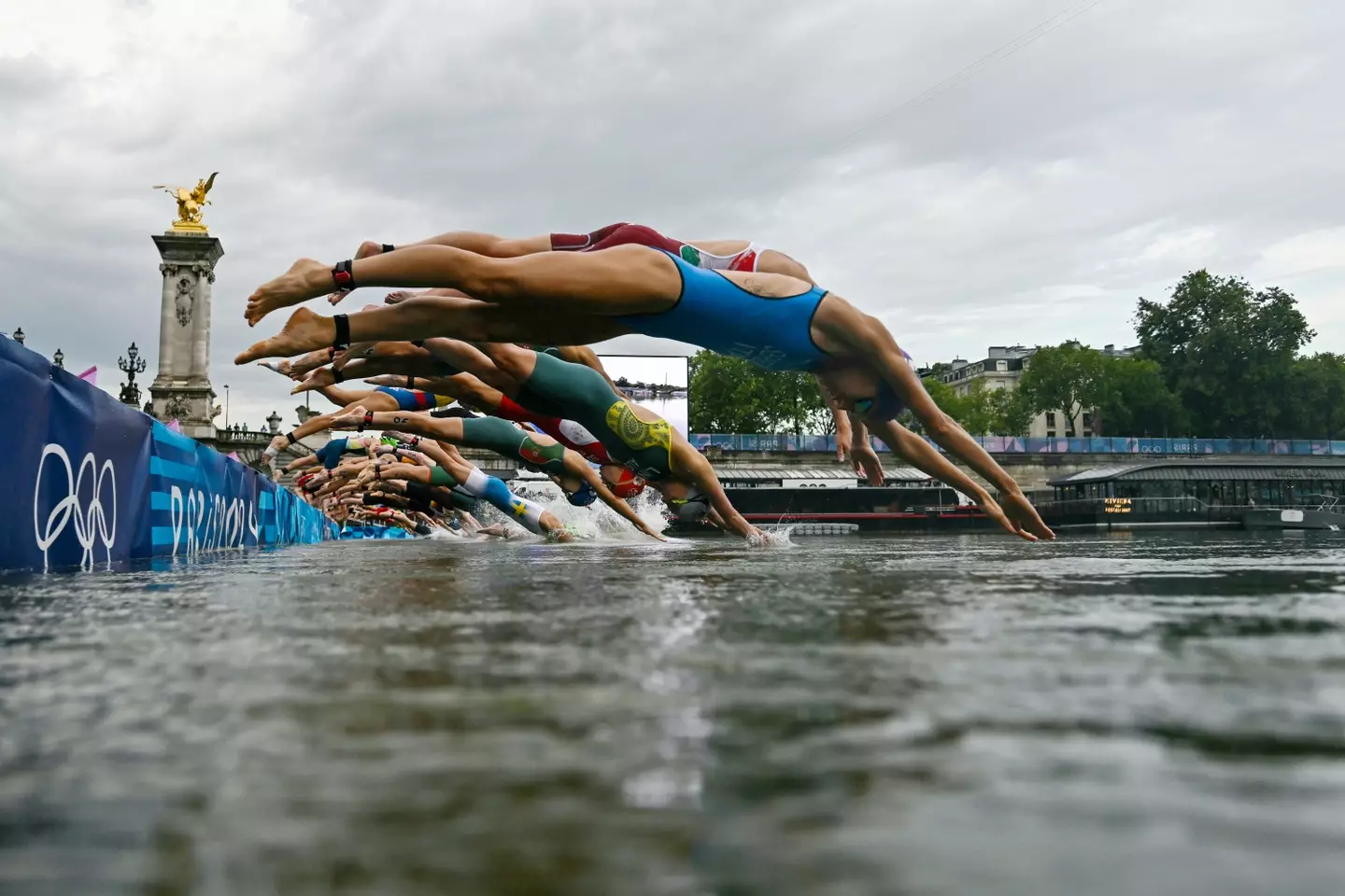Both Michel and Briffod previously swam in the Seine. ( Martin Bureau - Pool/Getty Images)
